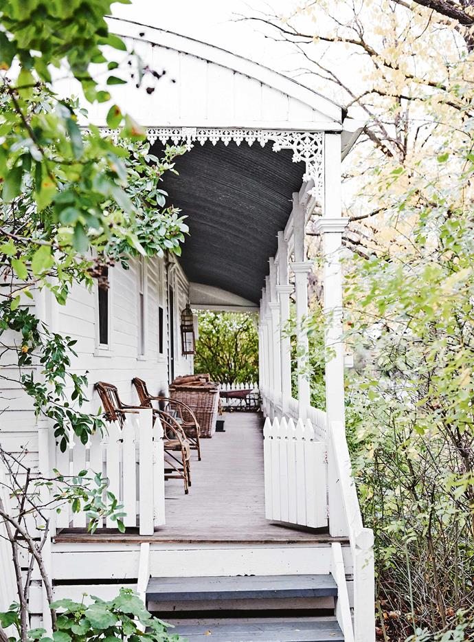 The owner of this [white weatherboard cottage](https://www.homestolove.com.au/white-weatherboard-cottage-victoria-13741|target="_blank") in rural Victoria repurposed these white gates to enclose her verandah. "They're from my grandfather's farm and were on the sheep-drafting race - I remember hanging off them as a little girl," she says.