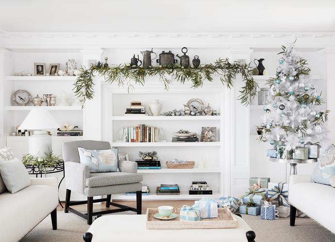 The built-in shelving is original to the house; its detail inspired the design of the joinery throughout the home. Judy bought the armchair and silver side table years ago. Assorted decorations from Myer, Big W, My Christmas and Ivory House.