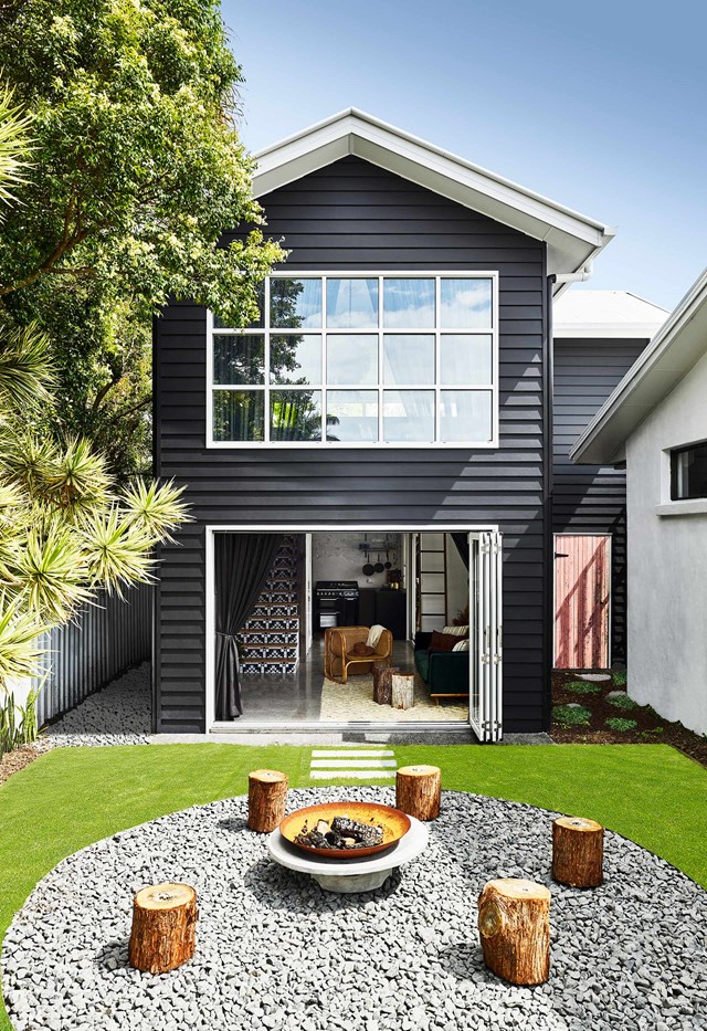 With it's high ceilings, loft bedroom, exposed timber beams and concrete floors, this [pool house that doubles as an Airbnb](https://www.homestolove.com.au/pool-house-19517|target="_blank") on the Sunshine Coast is a classic example of how a barn-style home can work in a coastal setting. The timber barn doors inside add to the rustic charm.