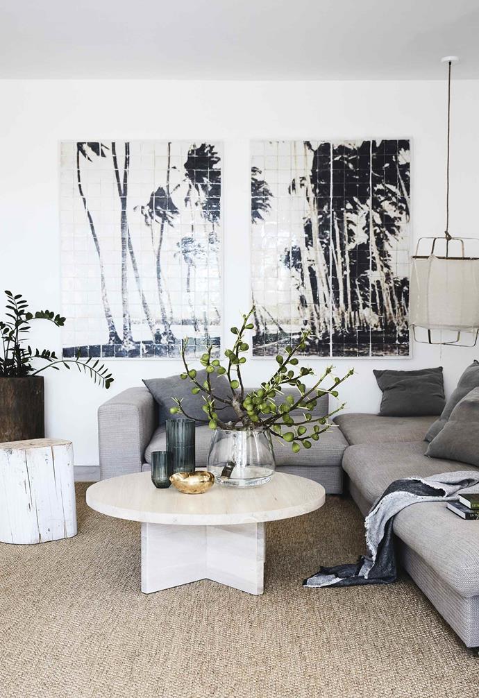 **Living area** "The sisal rug was custom made and makes the area seem bigger. It adds to the relaxed feel but still feels elegant," says Louisa. The palm tree art is by Byron Bay artist Jai Vasicek. "The cool tiles work nicely with the linen sofa from Camerich," she adds. Ay Illuminate 'z1 black' pendant light, [Spence & Lyda](https://www.spenceandlyda.com.au/|target="_blank"|rel="nofollow"). Throw, [Country Road](https://www.countryroad.com.au/|target="_blank"|rel="nofollow"). Planter, [Garden Life](https://gardenlife.com.au/|target="_blank"|rel="nofollow").