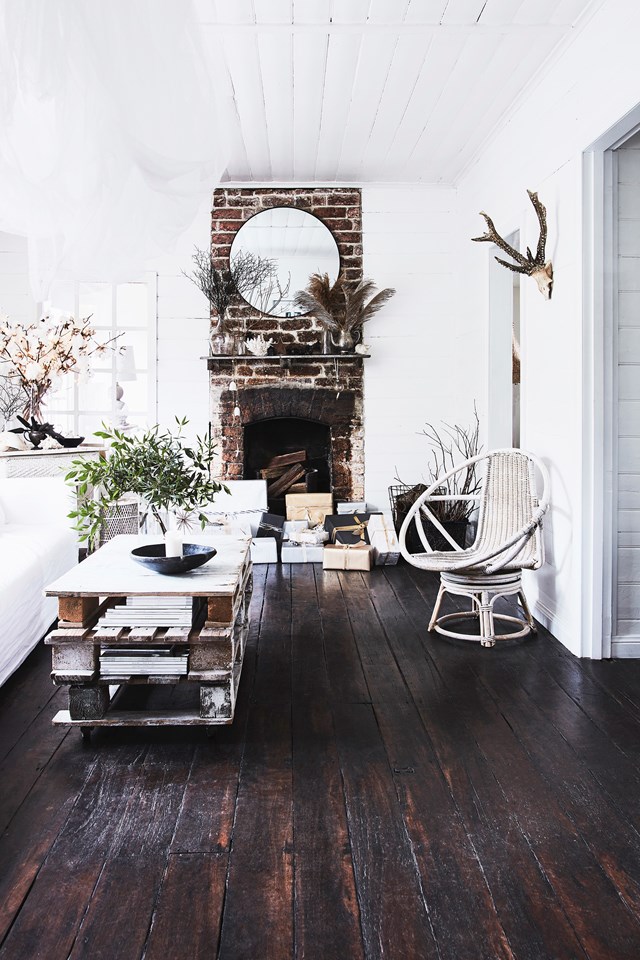 No matter its size and stature, a fireplace adds charm and value to a property. Simple and beautiful, [this all-white weatherboard cottage in the Kangaroo Valley](https://www.homestolove.com.au/the-cottage-kangaroo-valley-19551|target="_blank") is original and was the drawcard for the homeowners to purchase the property.