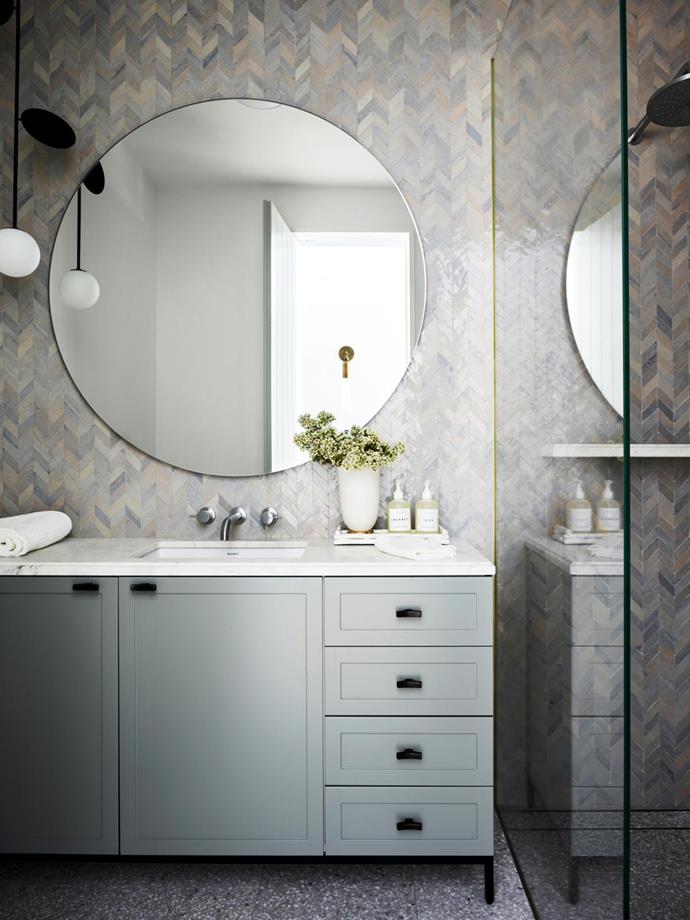 A bathroom in a [Sydney home designed by Arendt and Pyke](https://www.homestolove.com.au/sydney-home-by-arent-and-pyke-19550|target="_blank") featuring a chevron backsplash.