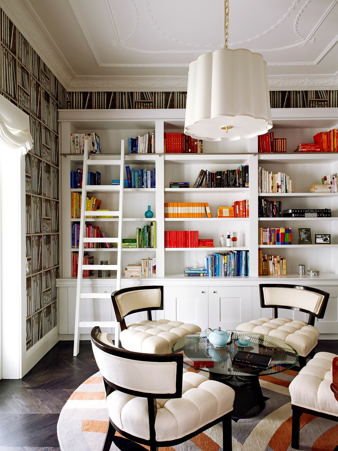 [Bookshelves](https://www.homestolove.com.au/10-bookshelves-in-australian-homes-5497|target="_blank") can be a common clutter culprit but not this beauty! Try colour-coding your books to make them a design feature rather than an eyesore. *Photo:* Anson Smart / *Belle*