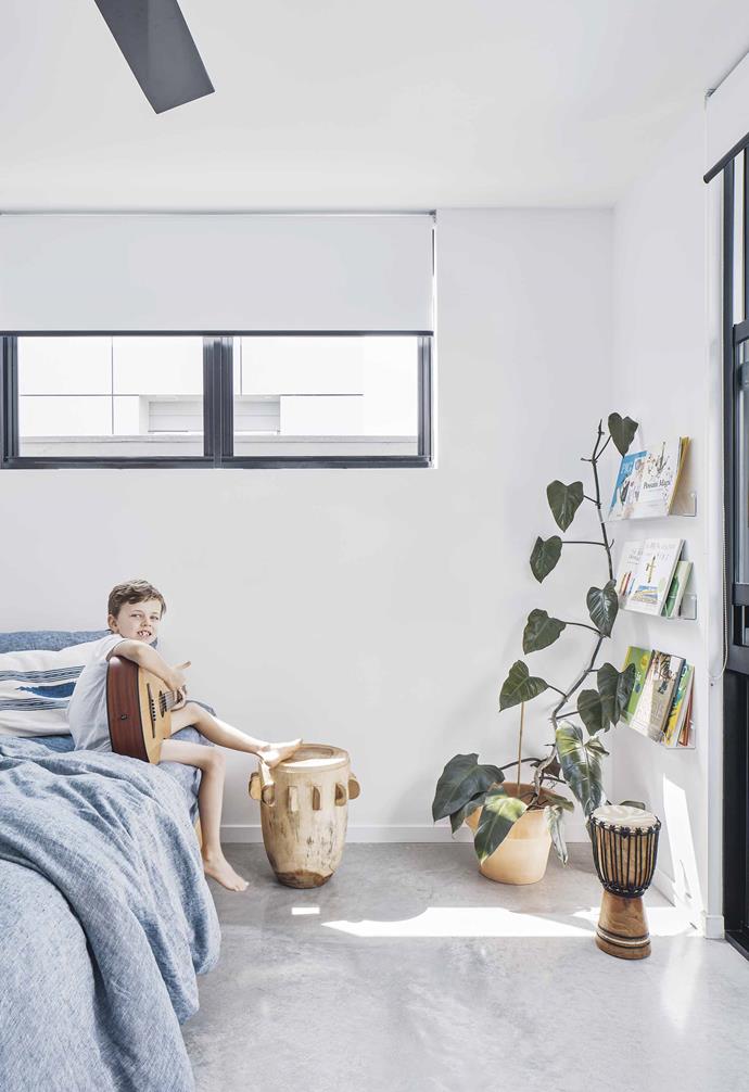 **Jude's bedroom** Linen bedding from Dos Ombré and a rustic 'The Tribe' stool from [Worn](https://wornstore.com.au/|target="_blank"|rel="nofollow") won't date as Jude grows. The bongo drum was a gift.
