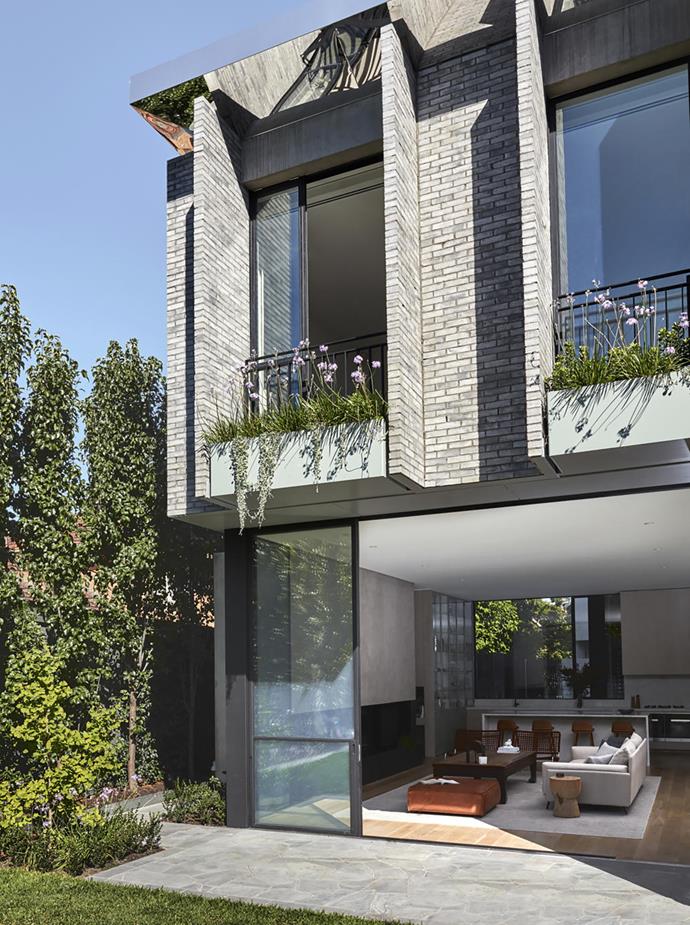 The exterior of this home designed by Inglis Architects is starkly modern and bears the hallmarks of Brutalist design. It has been finished in handmade bricks from Denmark. *Photo*: Sean Fennessy | *Styling*: Jessica Lillico | *Belle*