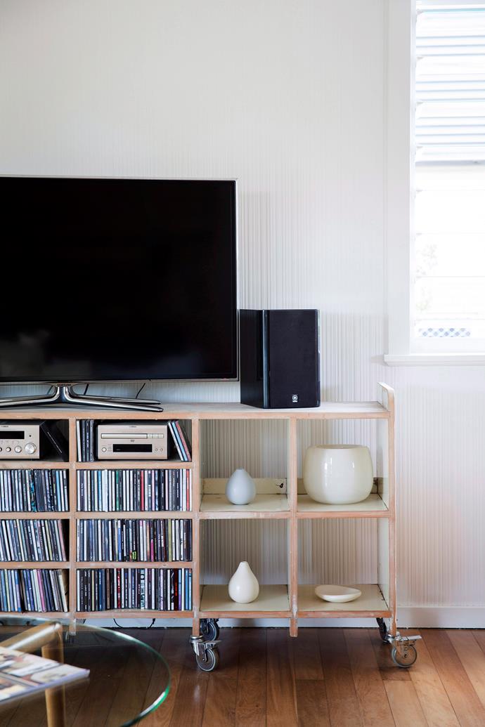 A stylish TV unit keep cords out of sight. *Photo:* James Henry