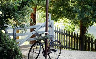 Bicycle leaning against a post at Lavandula Swiss Italian Farm