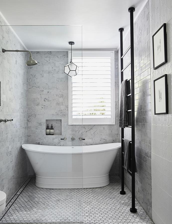 Doubling as the powder room, this space has a walk-in shower next to the Forme bath. Victoria & Albert basin and towel ladder, Just Bathroomware. Carrara marble vanity. Floor tiles and 'Infinity Richmond' ceramic wall tiles (at right), Amber Tiles. Taps, Brodware. Pendant light, bought in Bali