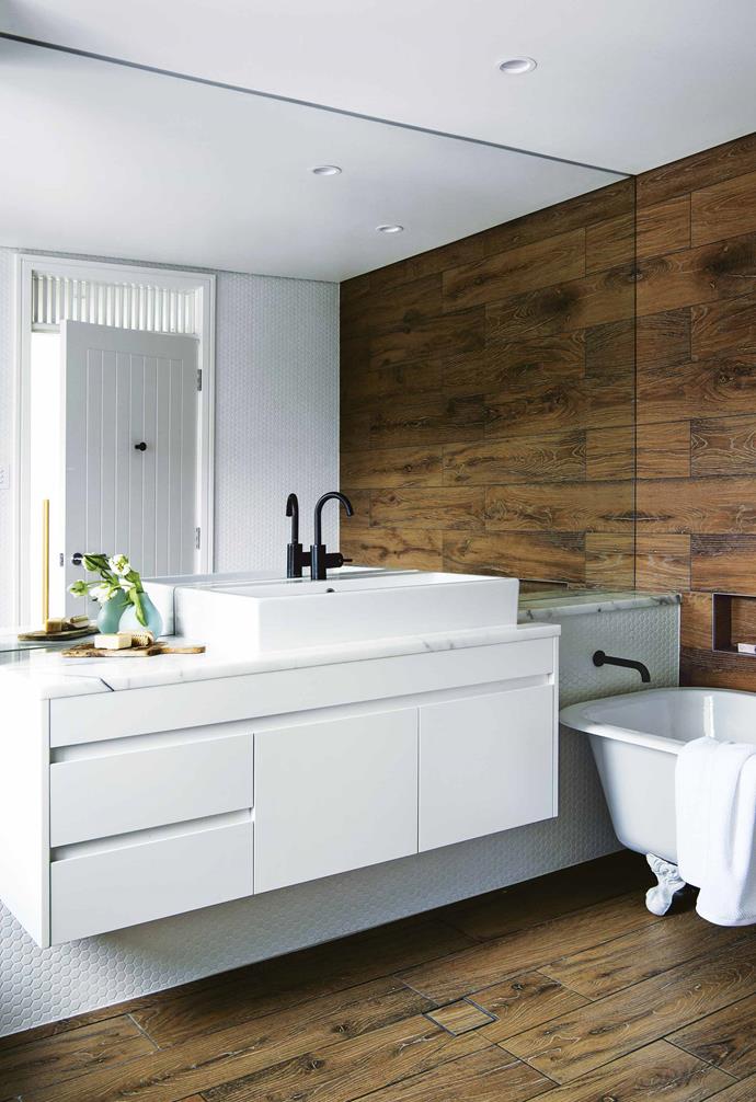 "There's a huge amount of information I've taken from old Federation houses and reinterpreted in a modern way," says architect Tash. "Having a window above a door is a really old, traditional Federation element, but it's a really good detail – it allows light and air to flow in houses."<br><br>**Bathroom** Timber-look ceramic tiles from [Exclusive Tiles](http://www.exclusivetiles.com.au/|target="_blank"|rel="nofollow") create a warm, welcoming look, while also serving a practical purpose in this wet zone.