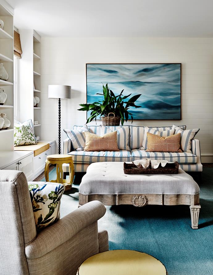 Blue, green and yellow add freshness to [this Mornington Peninsula home](https://www.homestolove.com.au/hamptons-style-mornington-peninsula-weekender-4558|target="_blank") designed by Adelaide Bragg. 'Jay' sofa from Boyd Blue upholstered in Romo 'Charcott' in Danube from Macro Fabrics.
