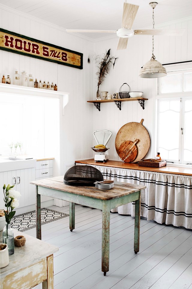 While contemporary French provincial kitchens will usually share a handful of similarities, it's the kind of style that really requires one-of-a-kind furniture. Achieve this by hunting down antiques, salvaging vintage décor and perhaps forgoing cabinetry altogether for a set of curtains! This is [renovated Queenslander in Bundaberg](https://www.homestolove.com.au/queenslander-white-interior-colour-scheme-19786|target="_blank") is full of fun and stylish DIY ideas. *Photo: Kara Rosenlund / Story: Country Style*