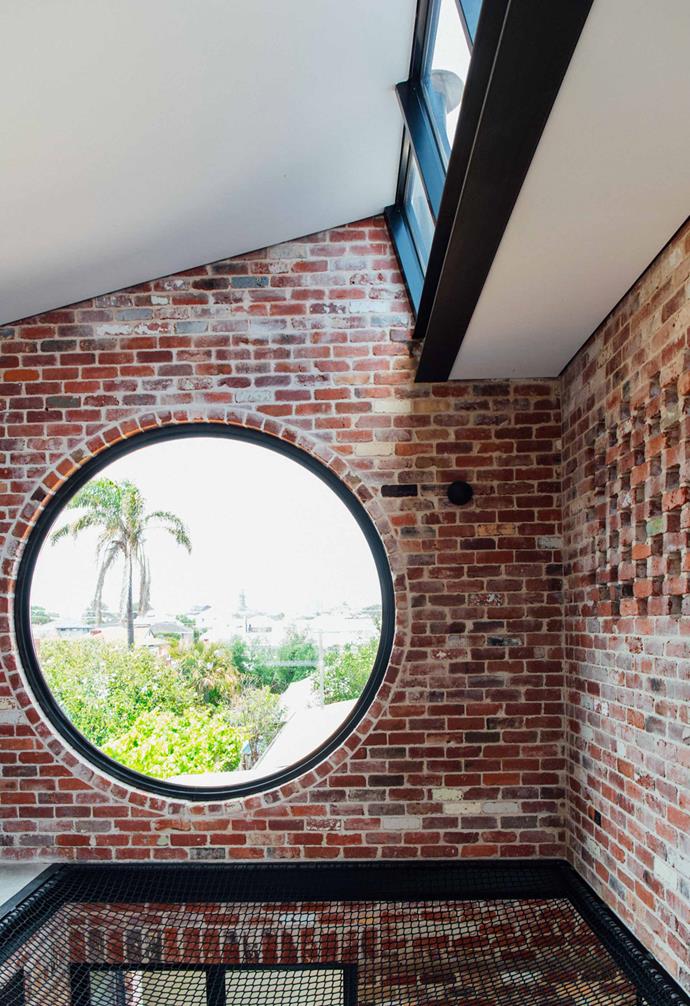 The perforations of the net and bridge allow the home to make the most of the natural light that floods in from the large circular window on either side of the home, as well as the windows lining the ceiling.