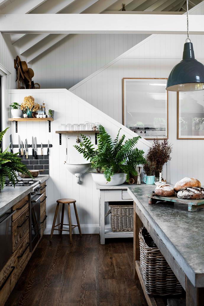 The kitchen in this newly built home is brimming with character thanks to salvaged timber accents and a custom-made [concrete bench](https://www.homestolove.com.au/concrete-design-ideas-20850|target="_blank").
