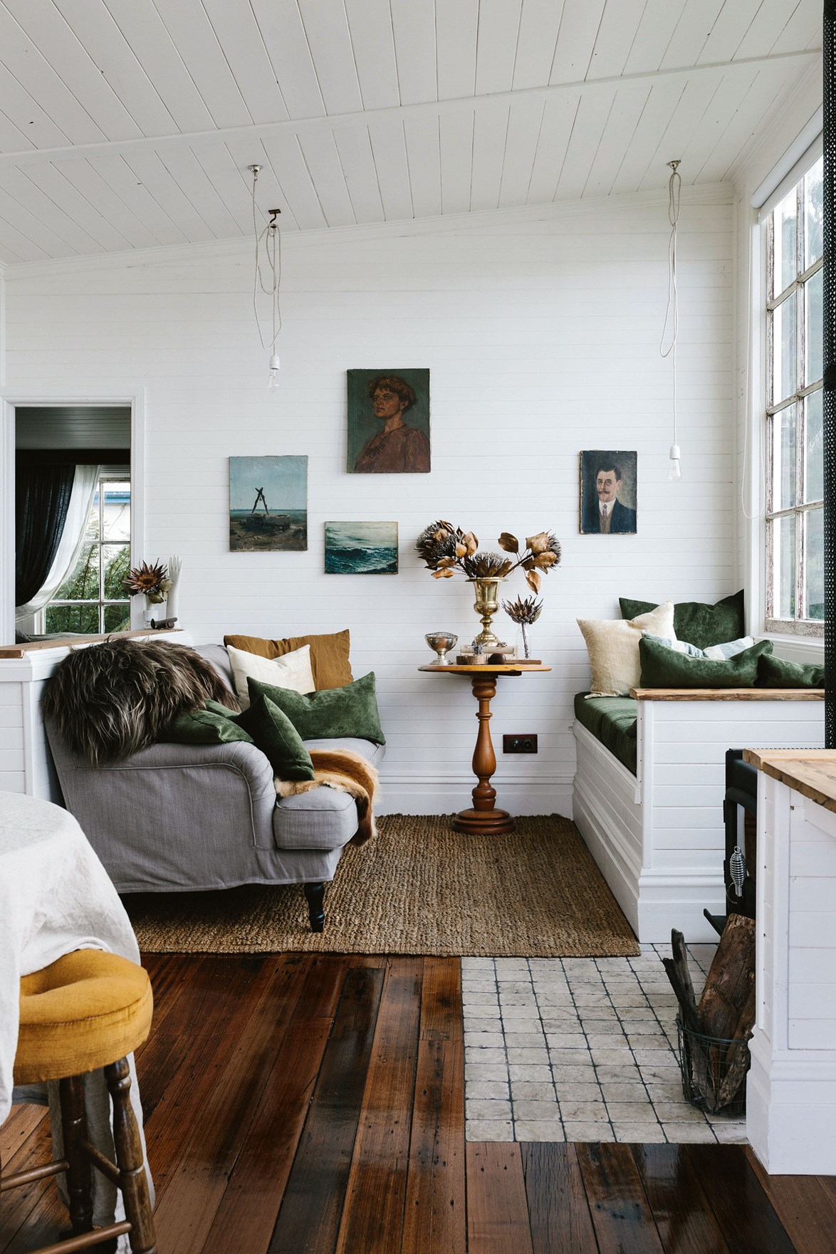 [Captain's Rest](https://www.homestolove.com.au/tasmania-airbnb-captains-rest-13981|target="_blank") is a cosy, one-bedroom Airbnb cottage in Lettes Bay, Strahan, in Tasmania. "I spent six months restoring it and falling in love with the tranquility of Tasmania's west coast," says owner Sarah Andrews. "When it's cold or wet outside, I sit in front of the large windows watching the water and hills with a fire lit in the wood burner."