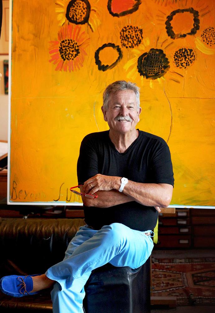 Ken sits in front of his Beyond Sunflowers artwork. *Photography: Stuart Spence*.