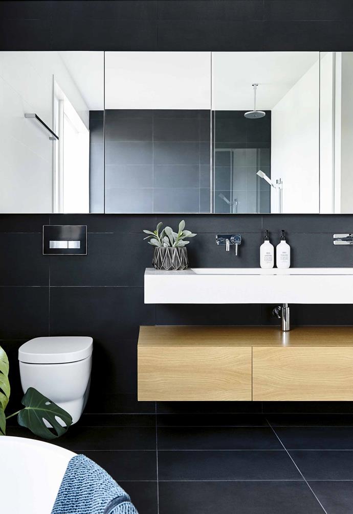 Floating shelves and a wall-mounted toilet were chosen to keep the floor clear in this stunning home. *Design: [Inform Design](https://informdesign.com.au/|target="_blank"|rel="nofollow") | Styling: Rachel Vigor | Photography: Derek Swalwell*.