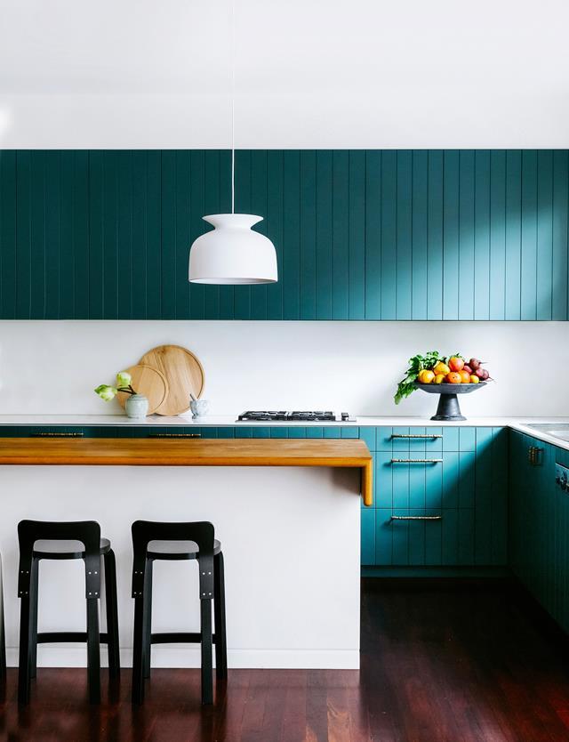 A moody teal was applied to the joinery in this [California bungalow kitchen](https://www.homestolove.com.au/colourful-california-bungalow-by-arent-and-pyke-4946|target="_blank"). The tallowwood-topped island bench is a favourite gathering place for the owners.