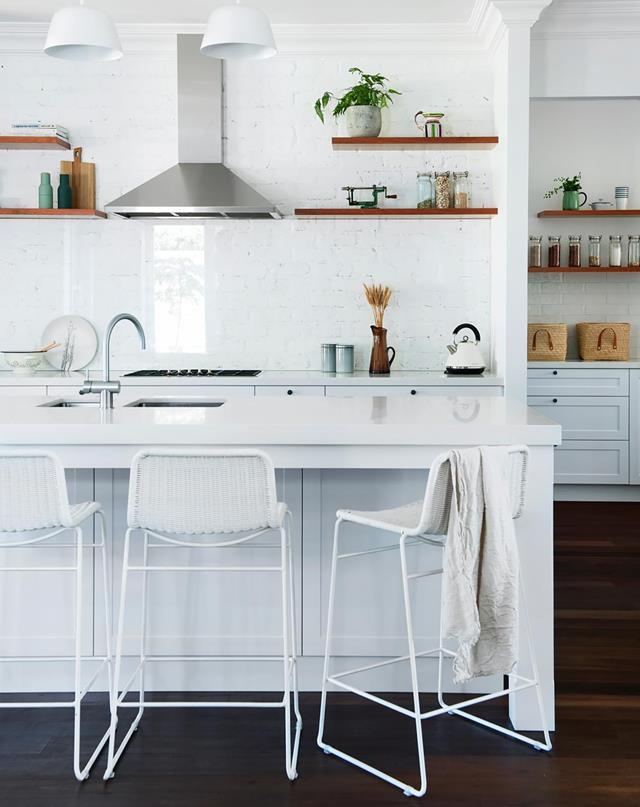 A black and white palette creates a fresh yet elegant feel in the kitchen of this [renovated Edwardian home](http://www.homestolove.com.au/gallery-edwardian-restoration-for-a-family-home-2447).