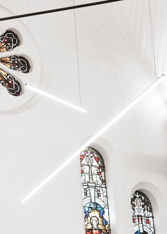 Bespoke light by Lucifero's Archi-Tech Lighting and the original 18th-century stained-glass windows.