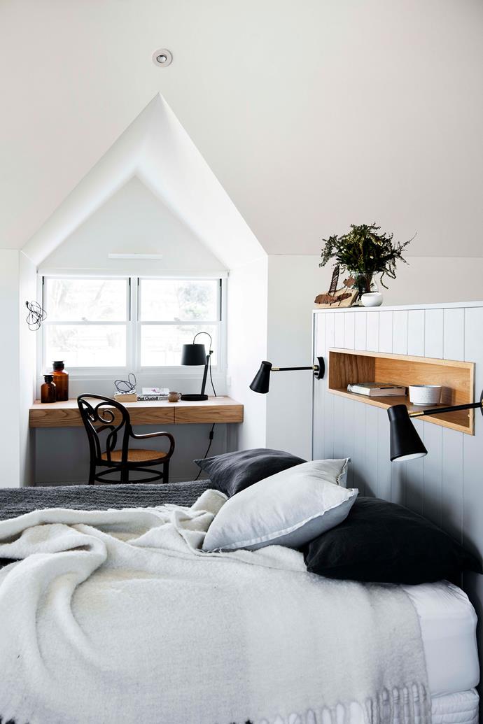 The couple's master bedroom is filled with natural light. By the window, they've created a desk nook including a café chair from Revival Antiques and 20th Century Design in Milton.