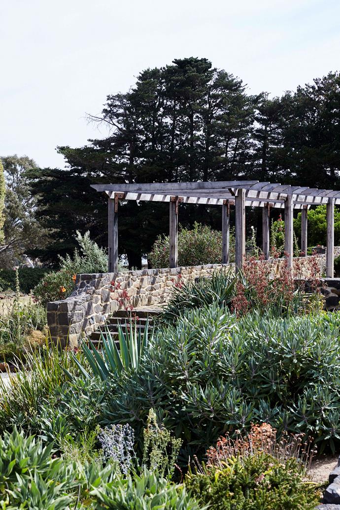 The restored Walling pergola leads from the terrace down to the lower garden.