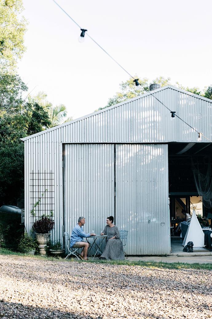 The exterior of the shed has remained largely untouched. After purchasing a property on the Sunshine Coast in 2016, Lisa and Bruce set about converting the corrugated iron shed into a temporary family home. Now, years later, the shed is a comfortable and unique home that the entire family loves.