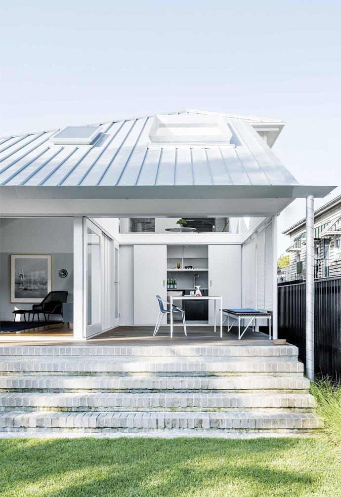 **Outdoors** The home welcomes the outdoors in with flexible zones. "When the new roof went on the downstairs living area, the tremendous height and volume of the room became obvious," says Mike.