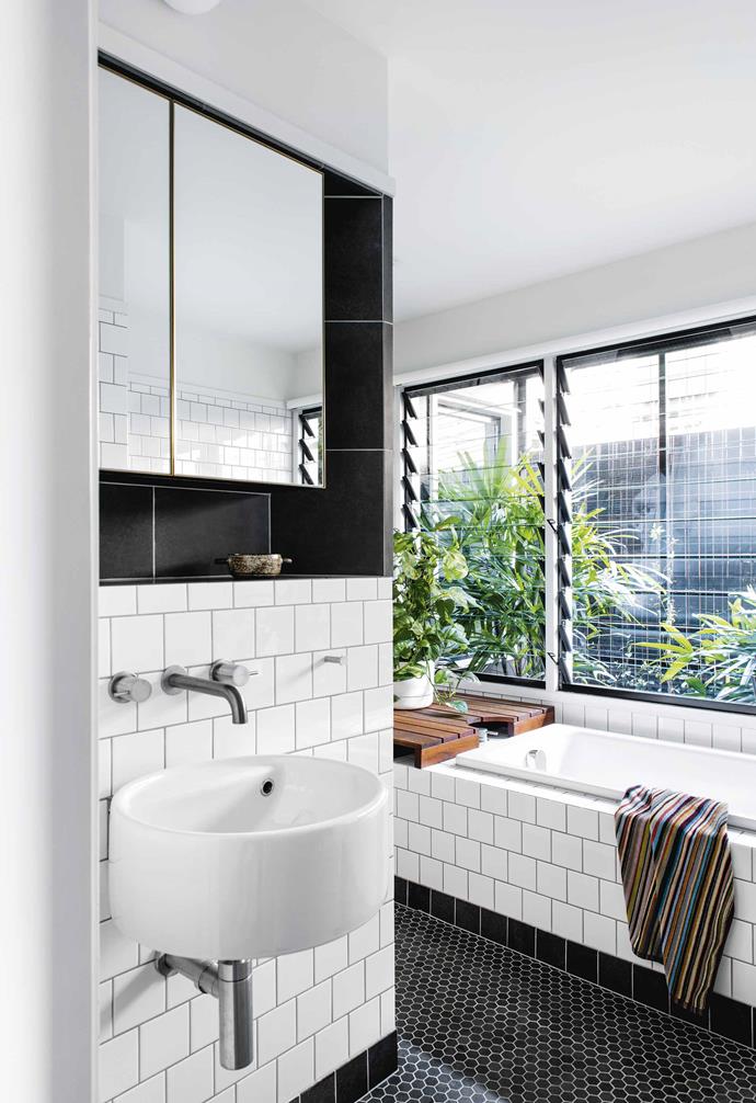 **Bathroom** Square glazed-ceramic wall tiles in white and black from [Metro Tiles](https://www.metrotiles.com.au/|target="_blank"|rel="nofollow") are part of a festival of shapes that includes hexagonal honed-bluestone mosaic tiles on the floor. [Parisi](http://www.parisi.com.au/|target="_blank"|rel="nofollow") 'twinset 425' basin, [Astra Walker](http://www.astrawalker.com.au/|target="_blank"|rel="nofollow") 'Icon' wall set.