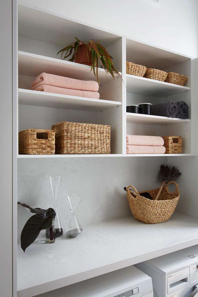 If you opt for open shelving, make sure you keep your display tidy and aesthetically pleasing with decorative storage containers and baskets. *Photo:* Kinsman