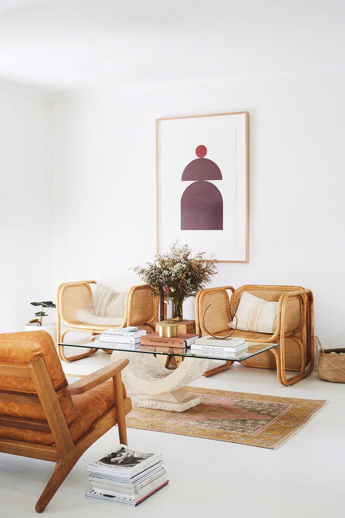 Earthy yet elegant, this Byron Bay home is a beautiful example of how combine different interior styles can produce something magical. Woven textiles from Morocco mix with [rattan furniture](https://www.homestolove.com.au/15-best-rattan-chairs-13693|target="_blank") pieces and modern art to create a colourful yet calming interior. *Photo:* Lynden Foss / *bauersyndication.com.au*