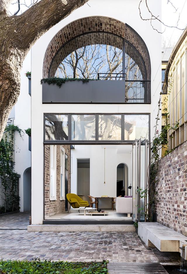 This remodelled Sydney [heritage terrace house](https://www.homestolove.com.au/remodelled-heritage-sydney-terrace-19592|target="_blank") provides ever-present proof that the arch never sleeps. Designed by architect Renato D'Ettorre. From *Belle* February/March 2019.