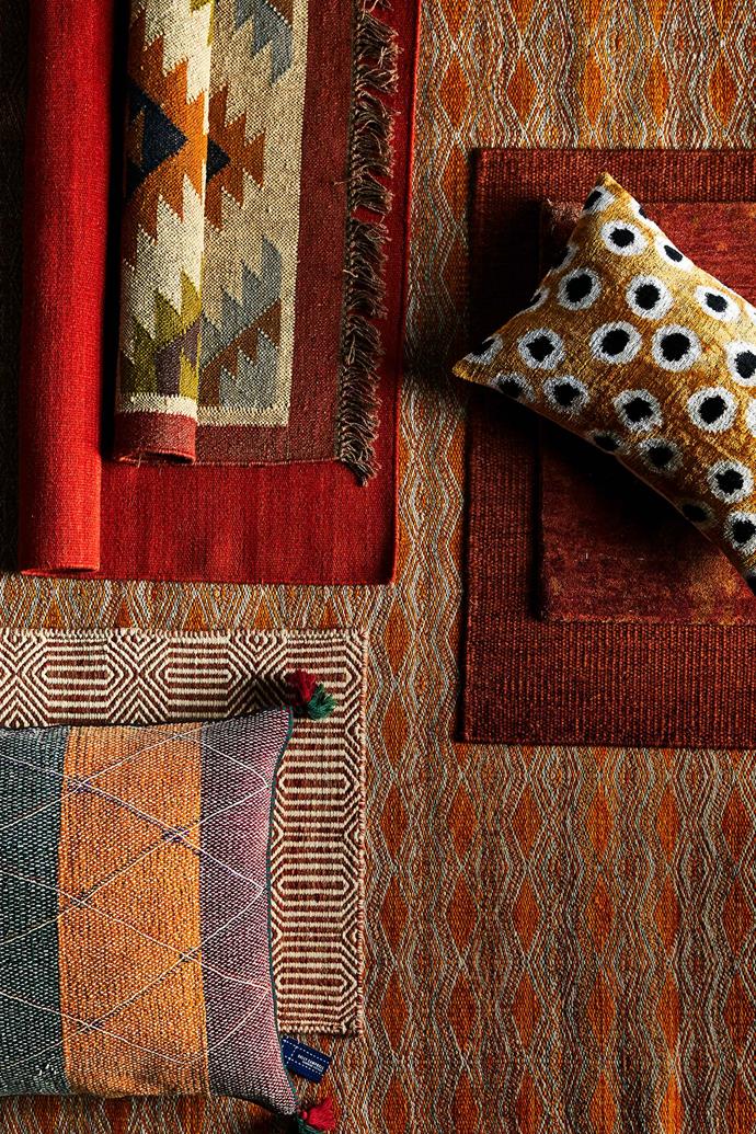**MOROCCAN INSPIRED RUGS**<p>
<p>Make a statement with floor coverings in warm autumn tones. The history of Berber and Moroccan rugs are interwoven (pun intended), but [Moroccan decorating](https://www.homestolove.com.au/luxe-trend-rocking-moroccan-style-at-home-2067|target="_blank") tends to conjure up images of rich hues, burnt oranges and vivid patterns. Turn your living room into a den of inspiration by layering up rugs in clashing colours and patterns.
