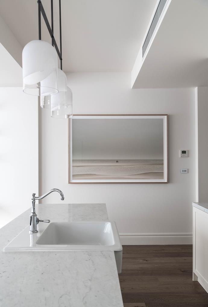 *The Franklin apartment*. In the kitchen: 'Moni Triple Pendant' from Articolo Lighting. Nick Horan Distance Series artwork by Nick Horan Photography.