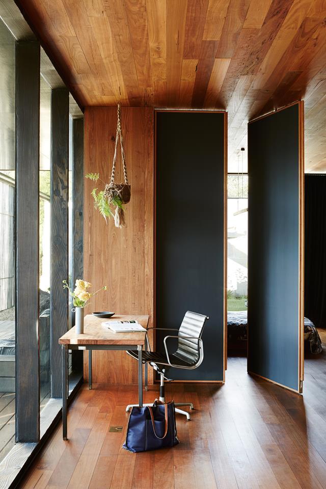 Some of the pivoting panels between the study and bedroom of this [award-winning eco home](https://www.homestolove.com.au/an-award-winning-eco-home-by-archier-5698|target="_blank") are painted with chalkboard paint (Porter's Chalkboard Paint in Sea Monster) so the owner can explore his creative side.