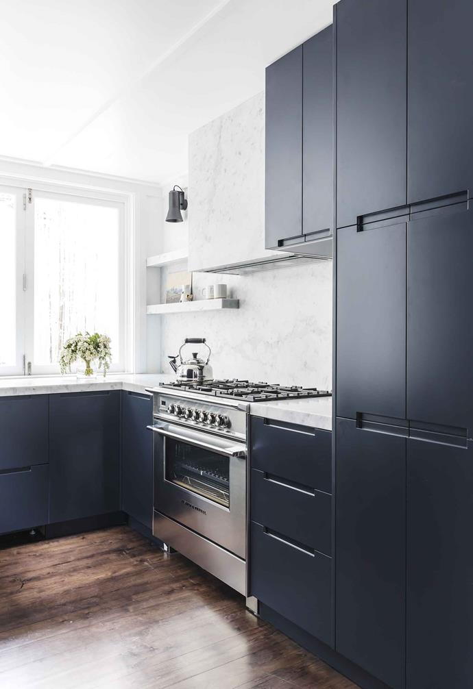 **Kitchen** New marble surfaces from Euro Marble have a calming effect on the space. The cabinetry is by Jillian Dinkel Designs, installed by [Madden Bespoke Interiors](https://navanbespoke.com/|target="_blank"|rel="nofollow"). Appliances, [Fisher & Paykel](https://www.fisherpaykel.com/au.html|target="_blank"|rel="nofollow"). Silhouette wall light, [Ross Gardam](https://rossgardam.com.au/|target="_blank"|rel="nofollow").