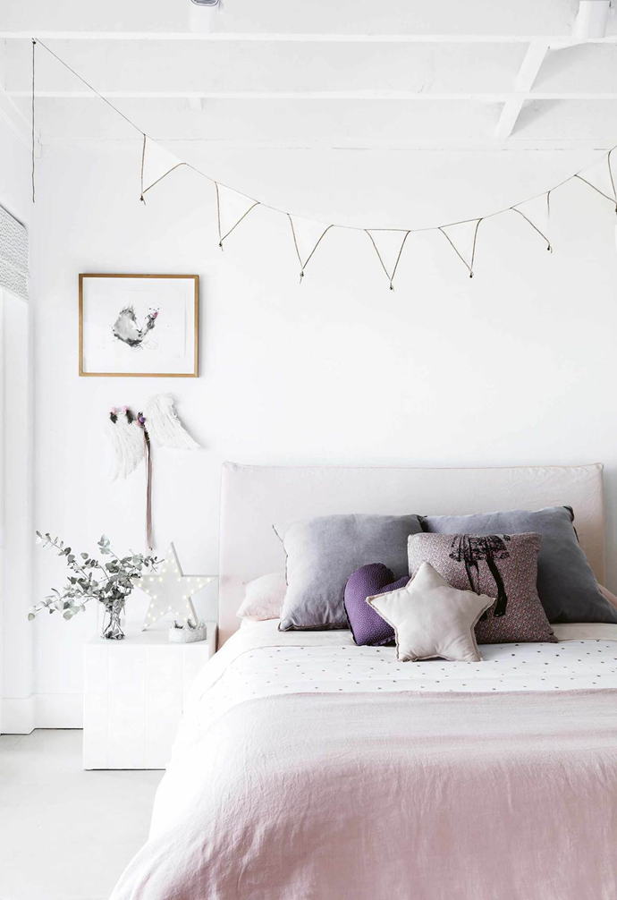 This white bunting suits this [dreamy bedroom](https://www.homestolove.com.au/mediterranean-style-all-white-home-16945|target="_blank") perfectly. *Photo:* Maree Homer