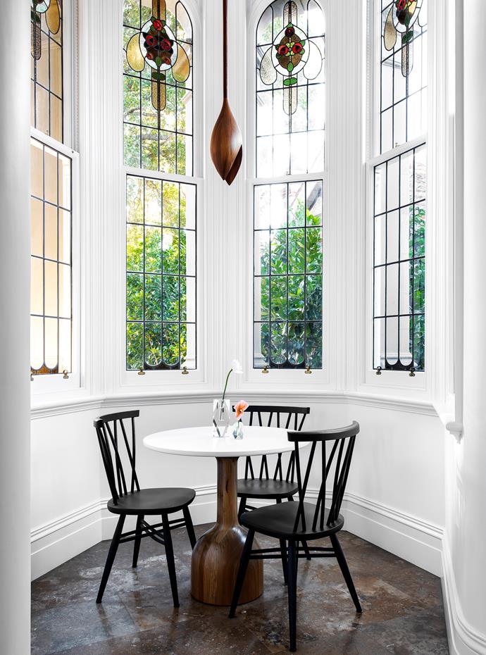 The north-east facing turret is the perfect spot to enjoy a morning coffee. Ercol 'Chiltern' dining chairs, Temperature Design. Pendant light bought in France. Local hero: Bandy dining table with Corian top, $5409, Jardan.
