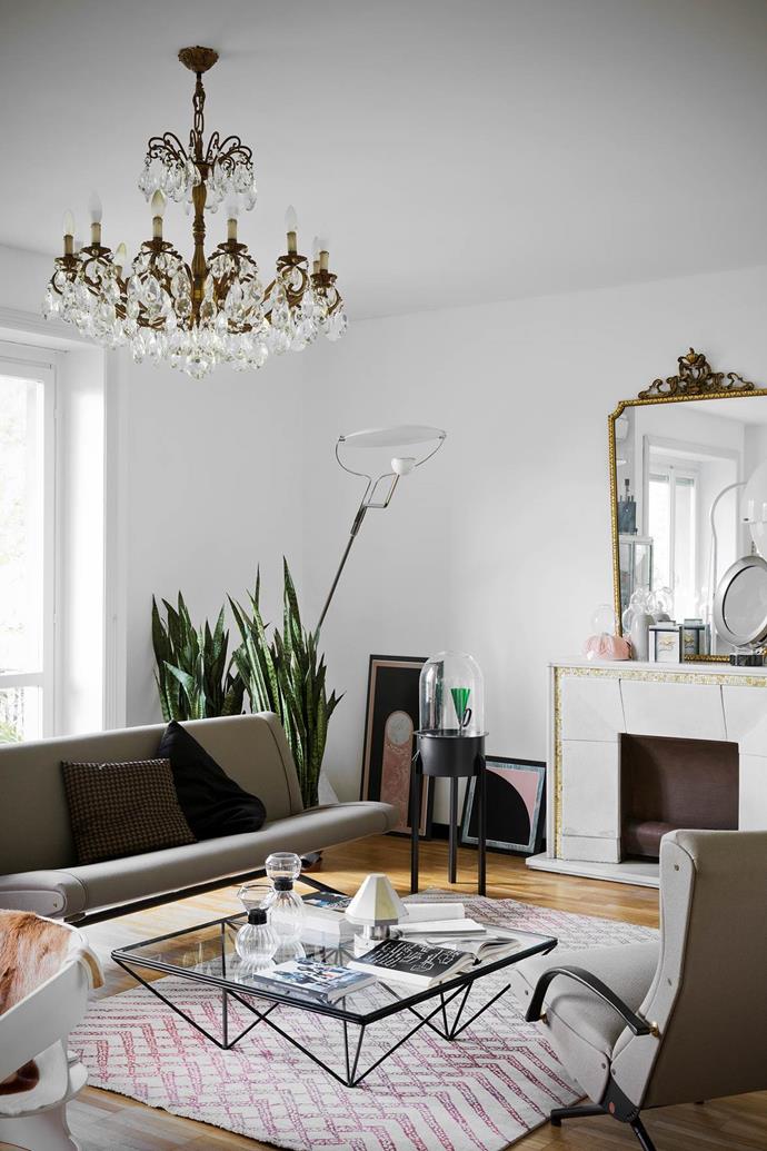 This light-filled [living room](https://www.homestolove.com.au/modern-eclectic-decorating-12728|target="_blank") is an emporium of beautiful objects including a gold French-style chandelier.