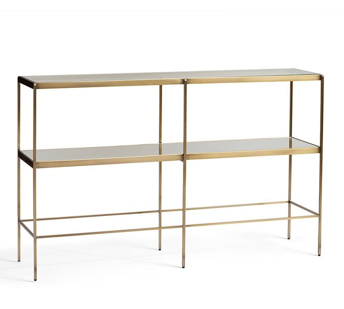 Shaken, or stirred? What better way to show off your cocktail set and fanciest glassware than on an elegant brass console? It will also bring a hint of glamour to the living room or home office. Leona Console Table, $799, from [Pottery Barn](http://www.potterybarn.com.au/leona-brass-glass-skinny-console|target="_blank"|rel="nofollow").