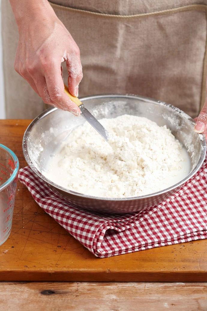 Use a round-bladed knife to gently combine the wet and dry ingredients.