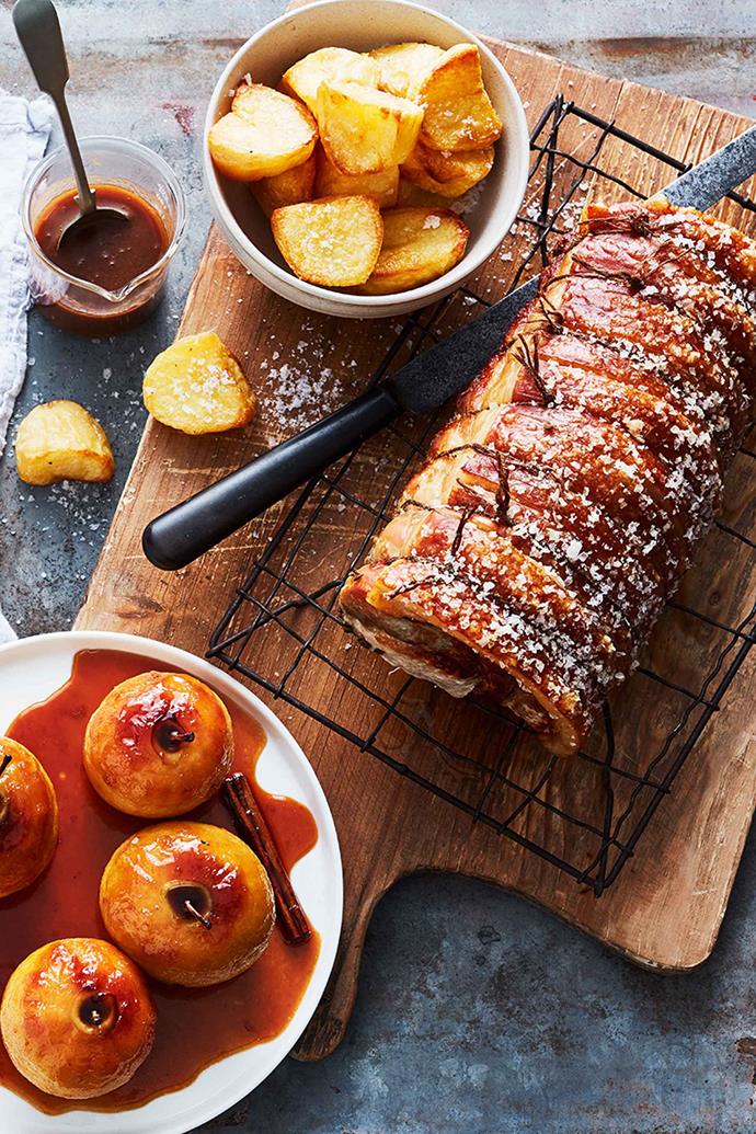 Serve roast pork with golden potatoes and slow-cooked apples for a delicious Sunday lunch.
