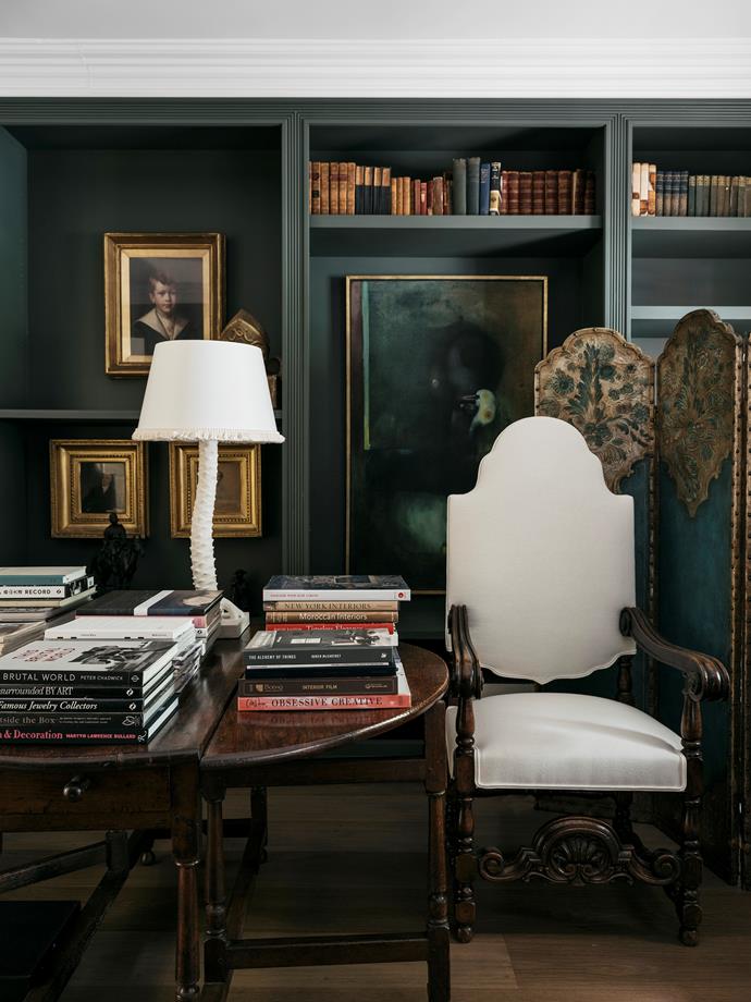 Gilt-framed portraits handed down through the family are displayed throughout the home, and mixed with contemporary artworks, such as the piece by Colin Lanceley.