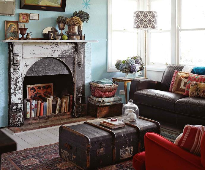 Living room with fireplace and maximalist decor