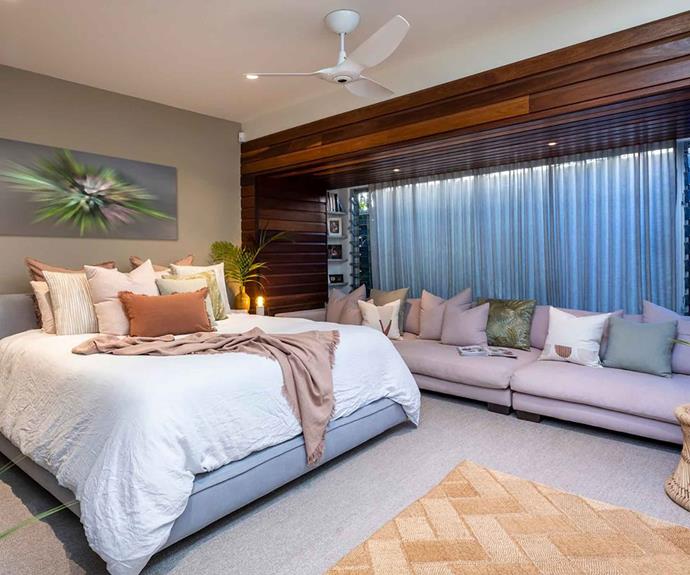 The master bedroom is equipped with a walk-in wardrobe, ensuite bathroom and a private courtyard garden.