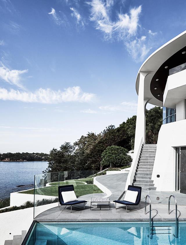Spellbound by its bold curves and biomorphic form, masterminded by renowned architect Reuben Lane in the late 1960s, Brendan Wong  returned the [local landmark](https://www.homestolove.com.au/1970s-coastal-home-with-contemporary-twist-20097|target="_blank") to its former glory. The Landscape design by Secret Gardens befits the home's modernist roots.