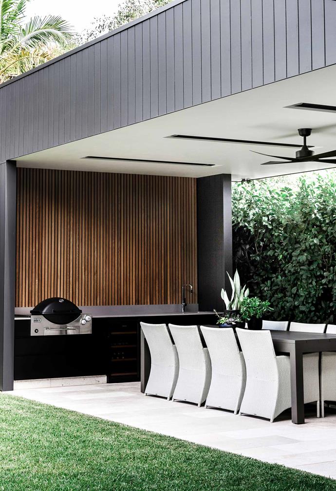 **Outdoor zone** Year-round entertaining was the goal for interior designer Kellie Margetson and her family when she co-designed their outdoor room. The impressive structure comes complete with an outdoor kitchen, a TV for watching sports, a fan for air circulation and radiant heaters to keep things cosy in winter, which ticks a lot of boxes. Outdoor furniture, [Robert Plumb](https://robertplumb.com.au/|target="_blank"|rel="nofollow").