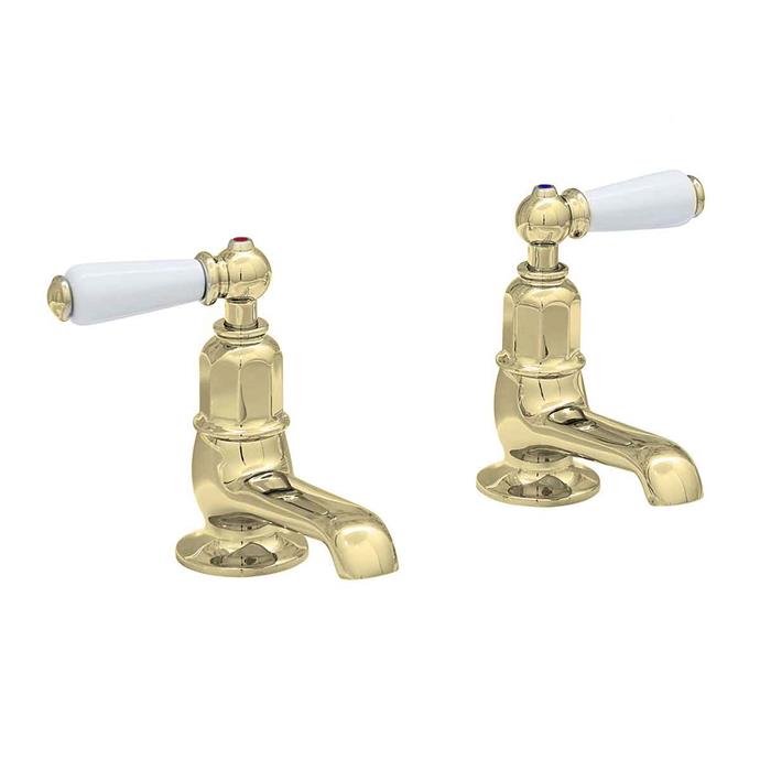 **SEPARATE HOT AND COLD**<p>
<p>Perrin & Rowe pair of basin pillar **taps** with white porcelain levers in gold, $774 each, from [The English Tapware Company](https://www.englishtapware.com.au/products/AU3475/|target="_blank"|rel="nofollow"). <P>