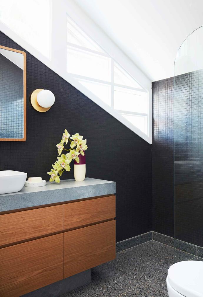 **Ensuite** The white angled windows are a unique feature, splashing light onto the Tocca mosaic wall tiles in Black from [Onsite](http://www.onsitesd.com.au/|target="_blank"|rel="nofollow"). Ensuite vanity in Eveneer Almond and top in Caesarstone Rugged Concrete. Ensuite light, [Douglas & Bec](https://www.douglasandbec.com/|target="_blank"|rel="nofollow").