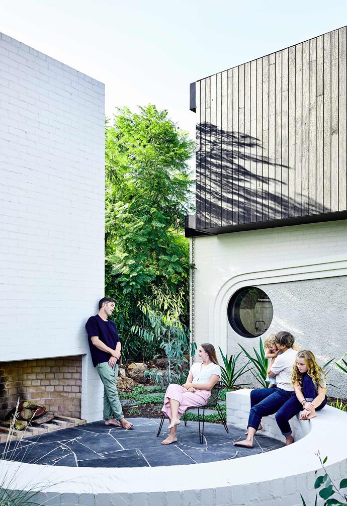 **Portrait** The family enjoy a moment by the firepit beside the new extension. Artworks: *Untitled 10 and 14* by Euan Heng, [Niagara Galleries](https://niagaragalleries.com.au/|target="_blank"|rel="nofollow").