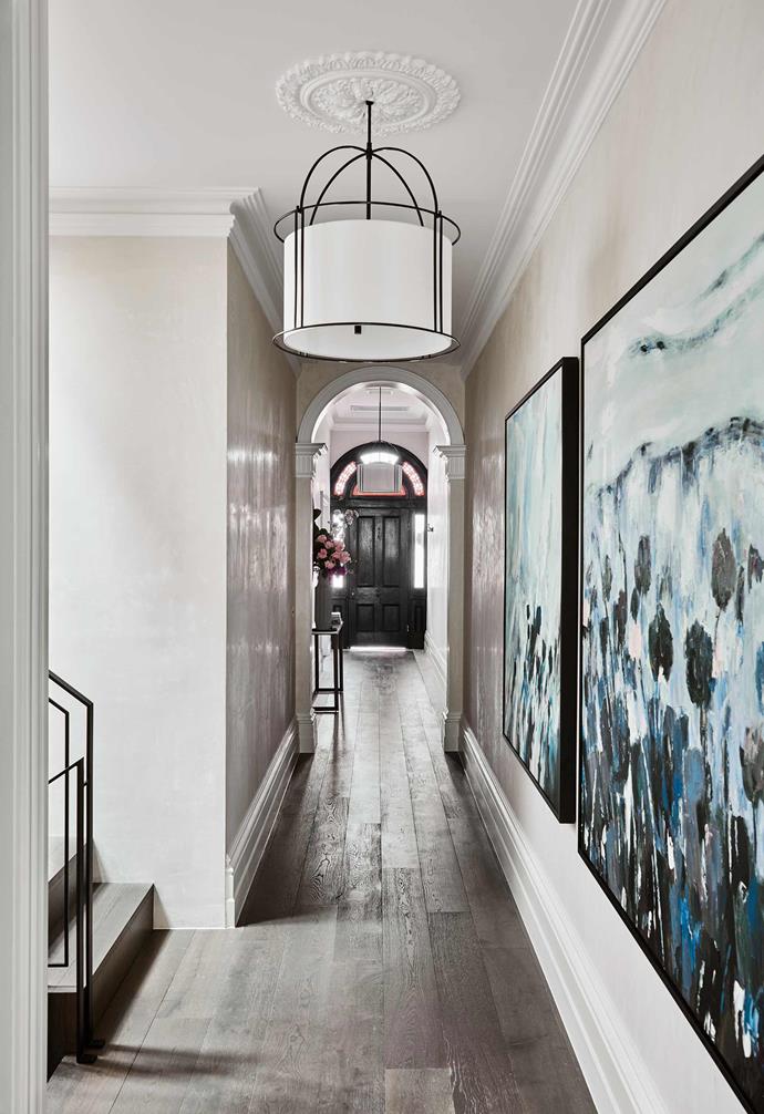 In the renovation of this [heritage home in Albert Park, Alisa and Lysandra](https://www.homestolove.com.au/the-block-alisa-lysandra-albert-park-renovation-19416|target="_blank") lined the entryway with a hallway console and dramatic artworks that honour the home's past. 